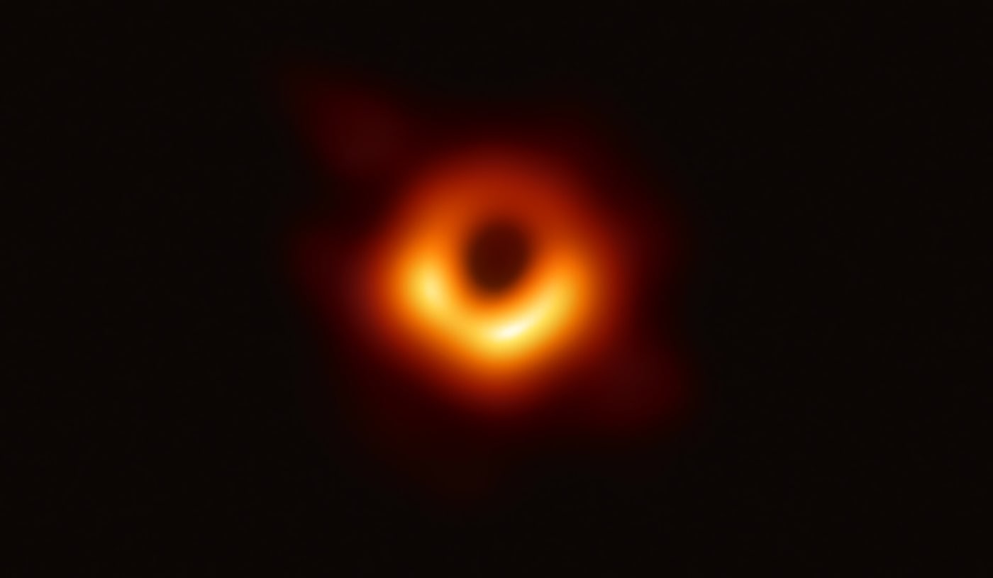 The 2019 Event Horizon Telescope image of M87*. Colour represents radio observations.